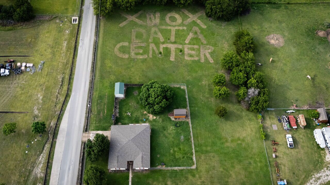 A home in Texas has NO DATA CENTER mowed into the back lawn.