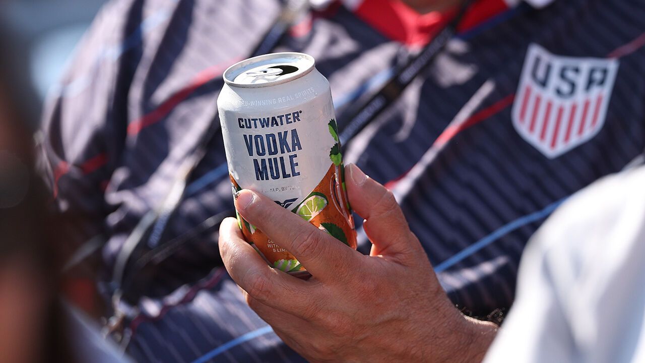 A fan drinks a Cutwater cocktail before the FIFA World Cup 2026 match between France and Sweden at New York New Jersey Stadium