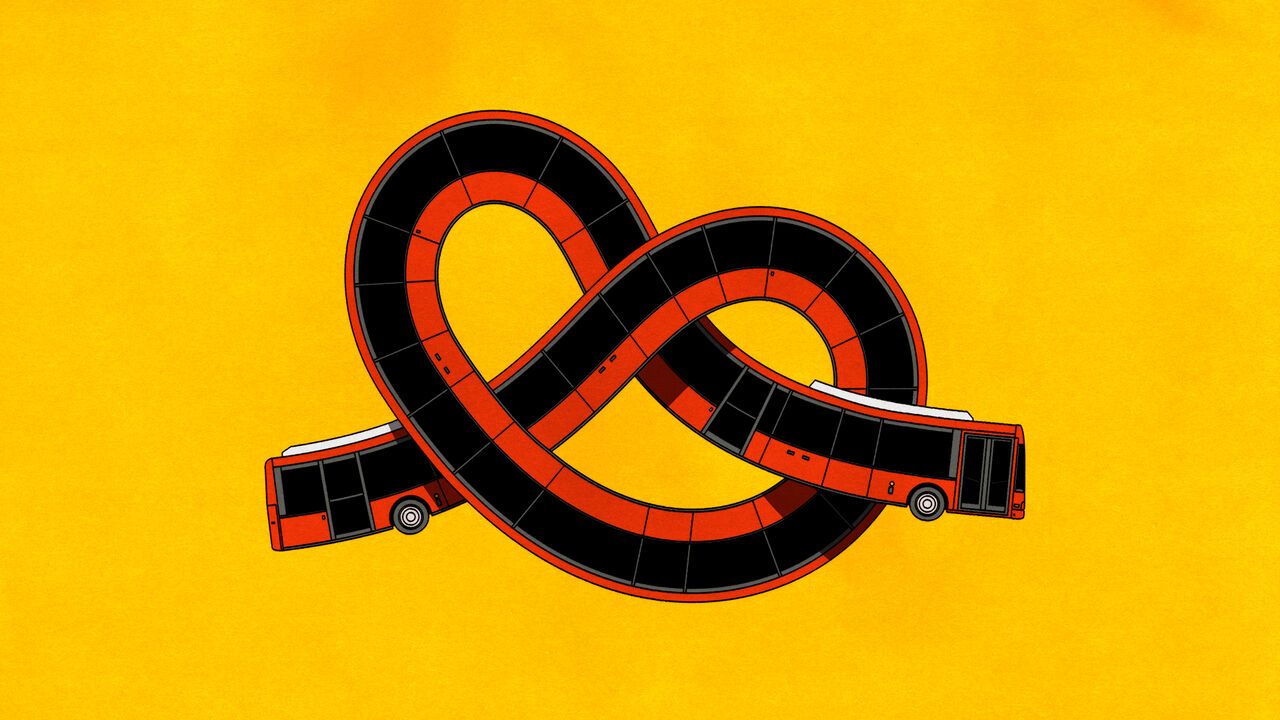 A long bus looping around itself