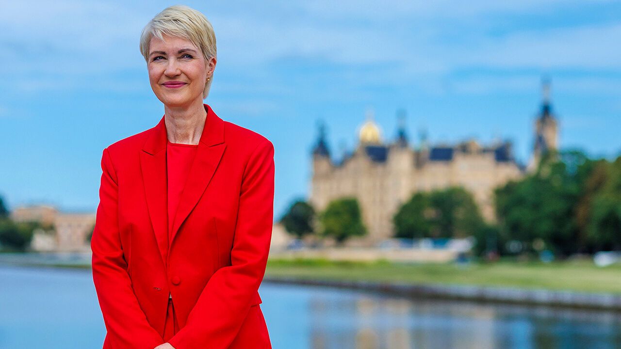 Manuela Schwesig in front of Schwerin Castle, Saxony-Anhalt, Mecklenburg-Western Pomerania