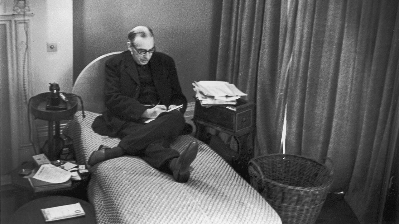 John Maynard Keynes (1883-1946) in his study at Bloomsbury, London.