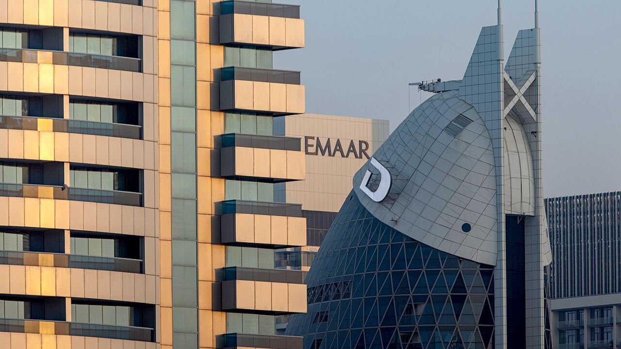 The logos of Emaar Properties PJSC and Damac Properties Dubai Co. on buildings in Dubai, United Arab Emirates
