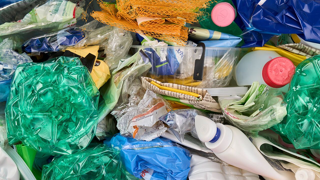 A close-up view of mixed single-use plastic waste