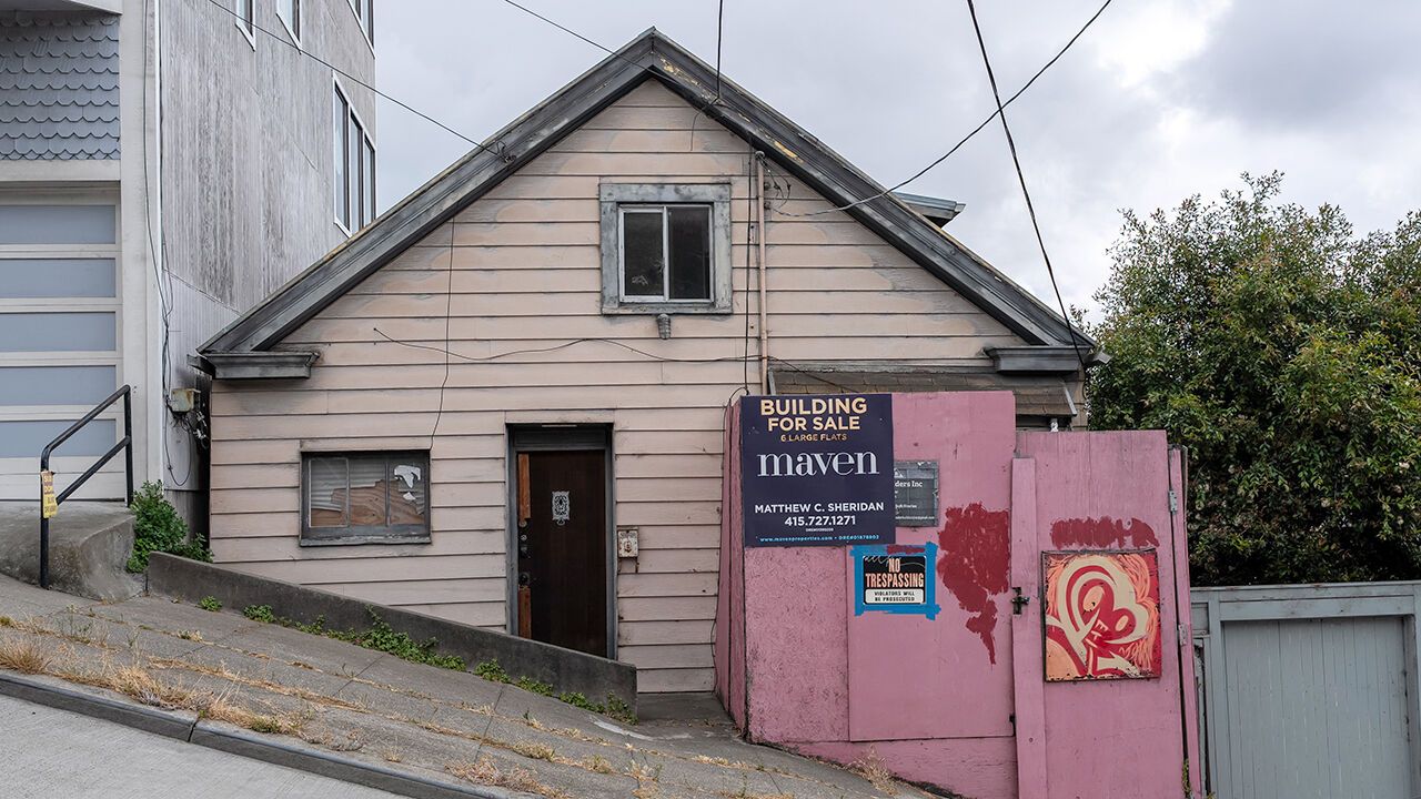 A for sale sign on a home in San Francisco, California