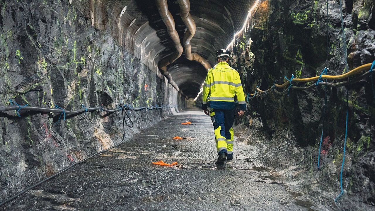 A worker walking in one of the tunnels at the Onkalo nuclear repository in Eurajoki, Finland
