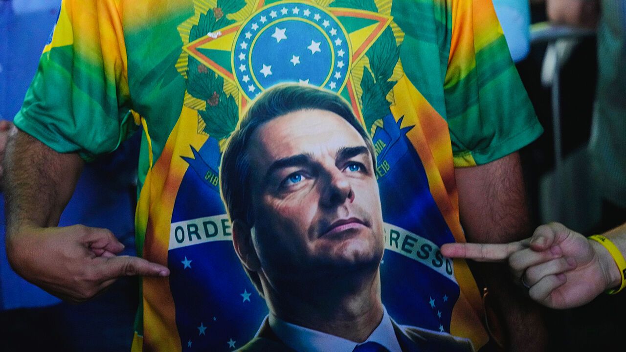 A supporter wears a T-shirt of presidential candidate Flavio Bolsonaro