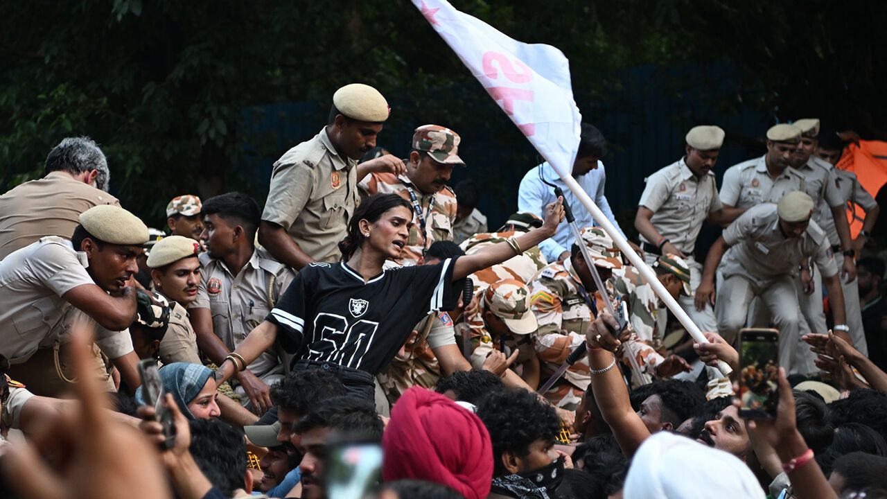 Demonstrators rally alongside opposition party members during a protest march on October 12, 2026 in New Delhi, India.