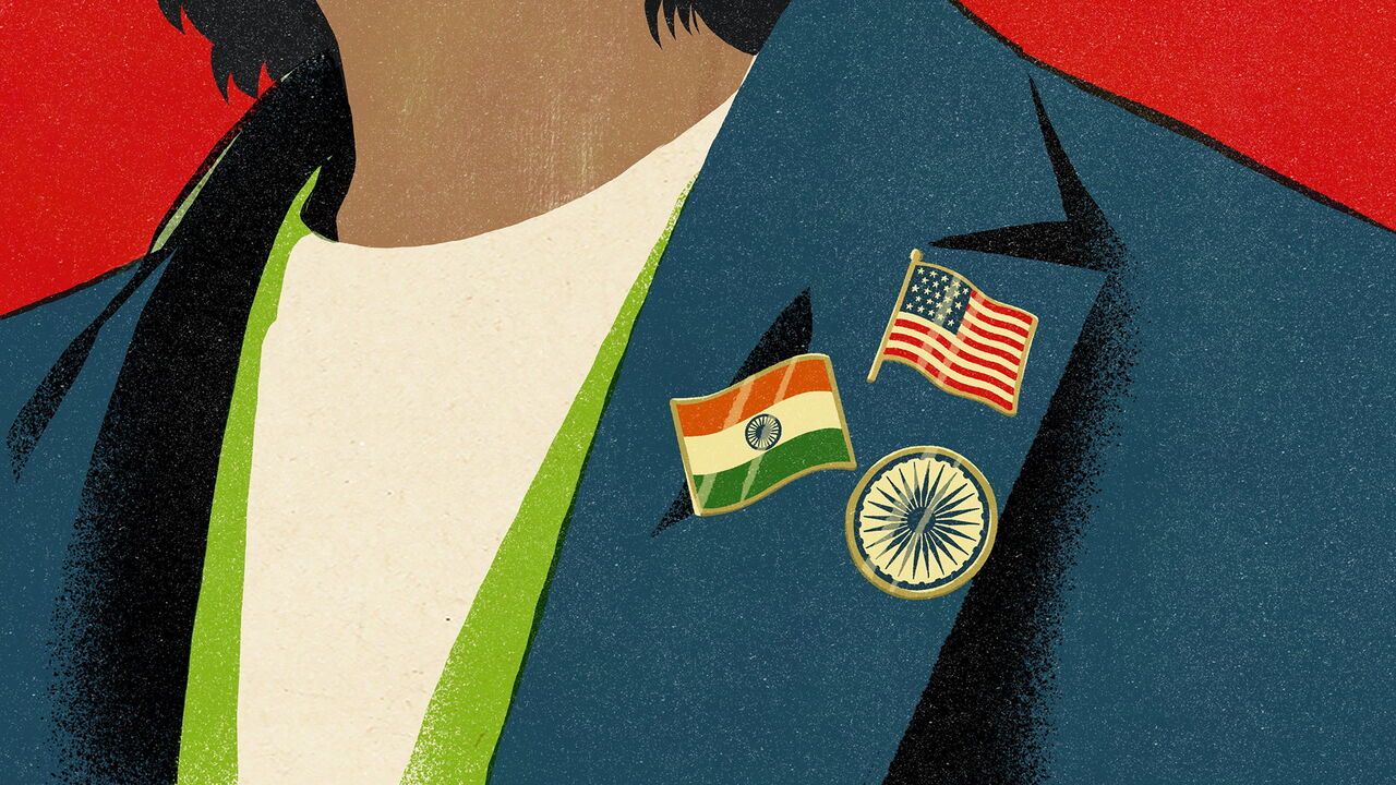Someone’s lapel with badges of the Indian and US flags