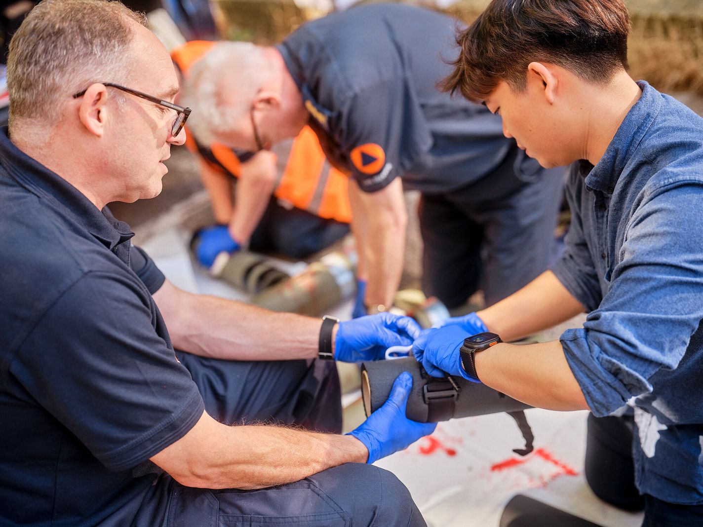 Volunteers learn first aid.