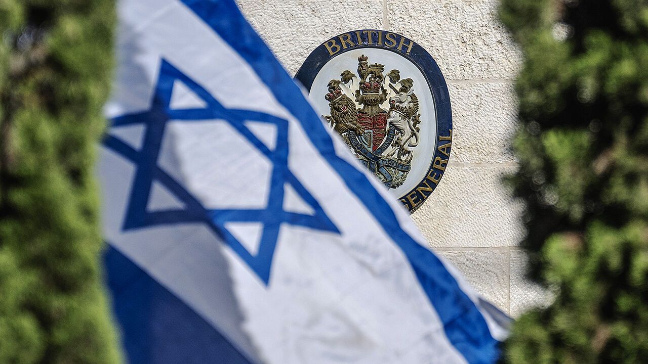 Sign and Israeli flag outside the British consulate in Jerusalem.