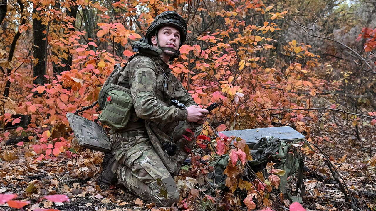 An artilleryman sets up Starlink satellite internet system in Zaporizhzhia region, Ukraine