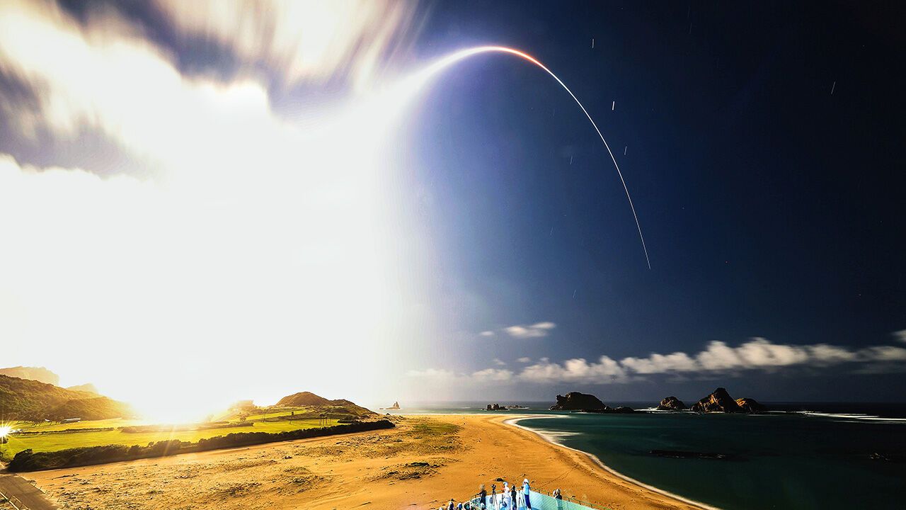The light trail of the H3 F10 launch vehicle carrying the MMX lifting off from the Japanese Space Centre