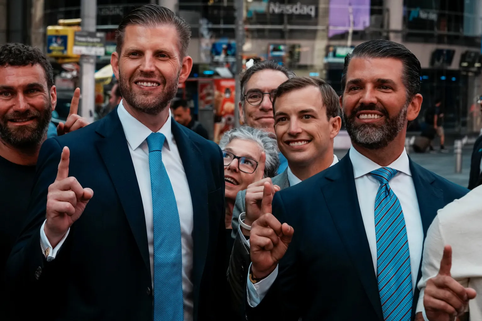 Zach Witkoff flanked by Eric Trump and Donald Trump, Jr., outside Nasdaq headquarters, New York City, August 2025