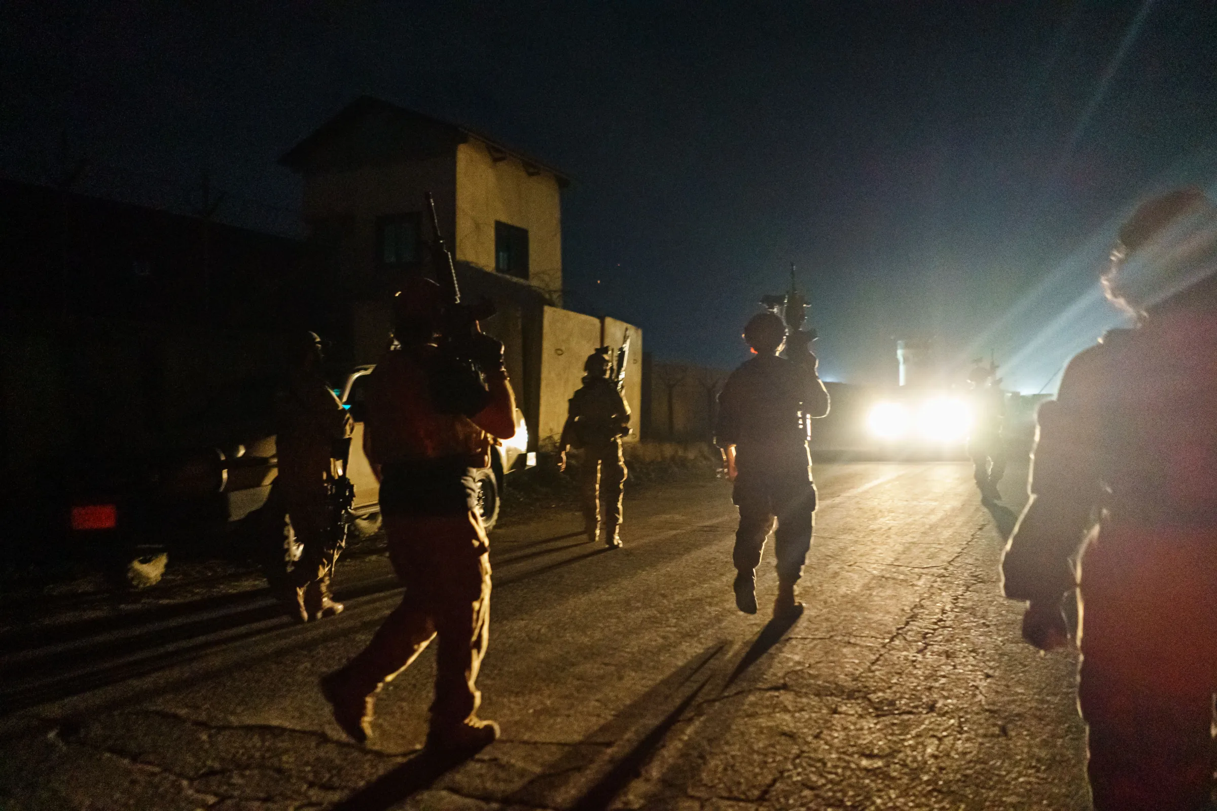 Taliban fighters storming Kabul International Airport after the U.S. withdrawal, Kabul, Afghanistan, August 2021