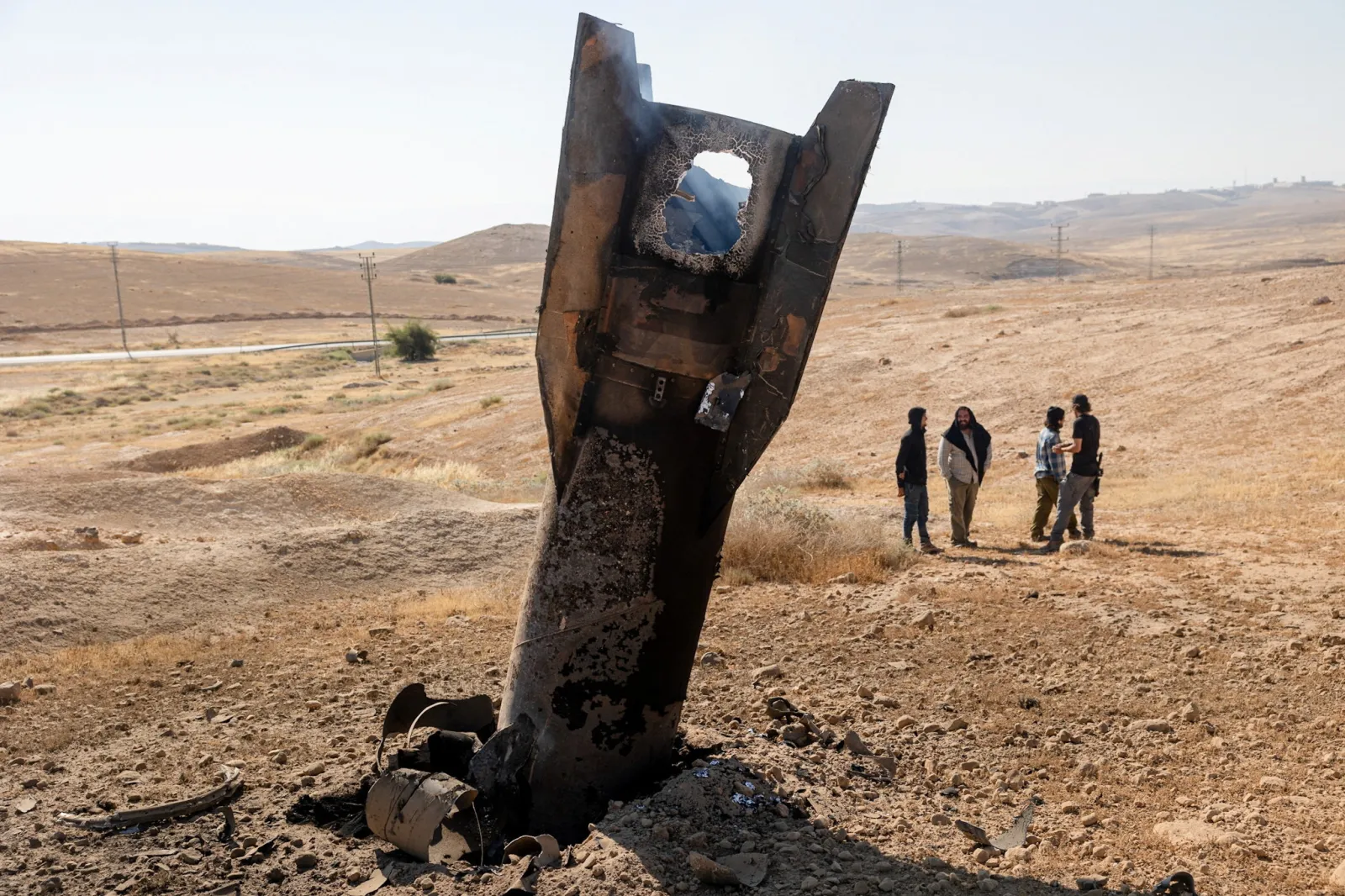 An Iranian missile protruding from the ground in the Israeli-occupied West Bank, June 2026